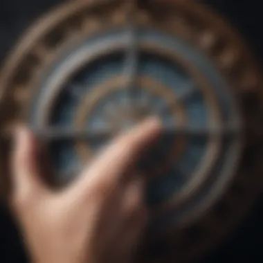 Hand Holding a Zodiac Wheel